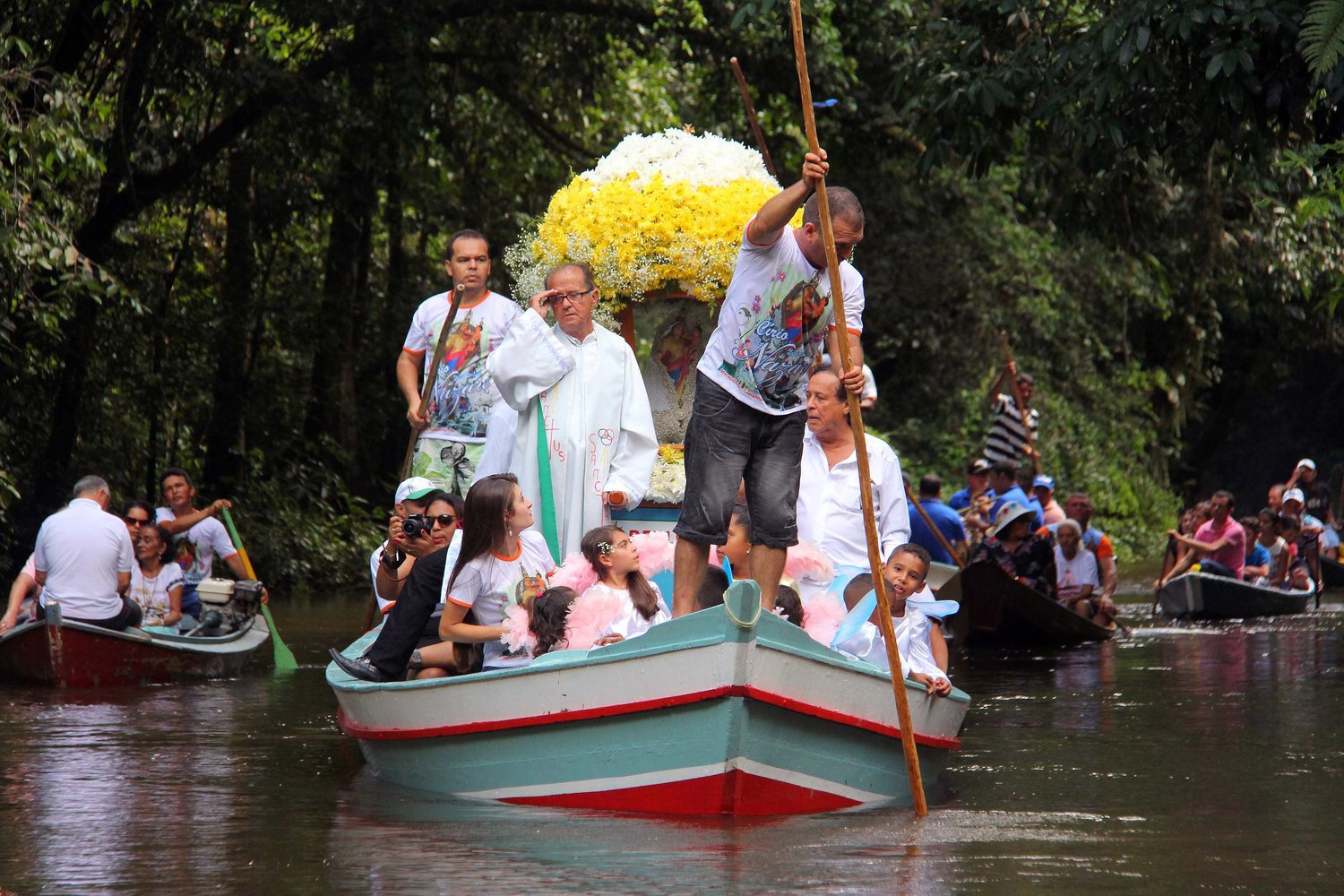 Pilgrims travel in boats as they accompany the statue of Our Lady of Nazareth during an annual river procession and pilgrimage along the Apeu River to a chapel in Macapazinho, Brazil, Aug. 3, 2014. The Vatican released Pope Francis' postsynodal apostolic exhortation, "Querida Amazonia"